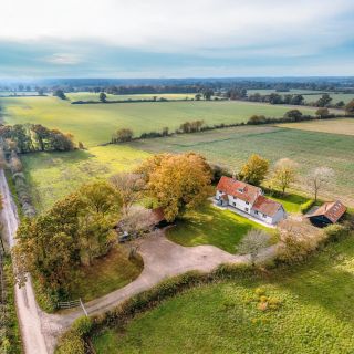 Nestled on a peaceful lane in Suffolk, this modernised Longhouse sits on three-quarters of an acre surrounded by farmland, a perfect tranquil retreat. Accessed via electric gates, it features a welcoming porch, a reception hall with quarry-tiled floors, and a sleek kitchen with a large island and bi-fold doors to the garden. The cosy sitting and dining areas have underfloor heating, while the upstairs offers a spacious landing and three charming bedrooms, including one with a vaulted ceiling. The second floor includes a generous bedroom and a stylish bathroom. An annexe provides the potential for guest accommodation or rental income alongside workshop and storage spaces. This elegant family home combines old-world charm with modern comforts and is offered with vacant possession. - Anthony and Gillie Pearce, @stackssuffolk and North Essex.

On with @winkworth_uk, guide £1 mil.

Contact Anthony and Gillie for more Suffolk and North Essex property buying info and advice.

#suffolk #suffolklife #longhouse #countryhouse #countrylife #familyhome #retreat #countryside #farmland #location #relocation #houseandgarden #househunting #propertyfinder #buyingagent #buyersagent #propertyforsale #40years #stackspropertysearch